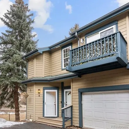 Buy this 2 bed condo on 5099 Camel Heights Road in Evergreen, CO 80439