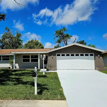 Buy this 2 bed house on 7841 Cayuga Drive in Jasmine Estates, FL 34653