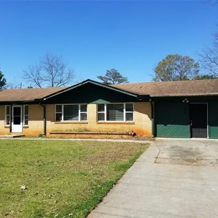 Buy this 3 bed house on 1217 South Hicks Circle Northwest in Conyers, GA 30012