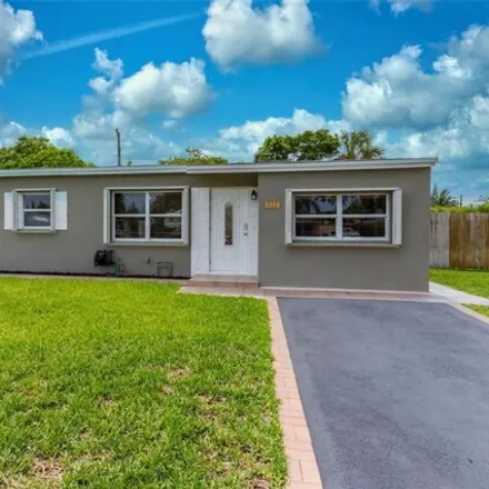 Buy this 2 bed house on 6001 NE 5th Ave in Oakland Park, Florida