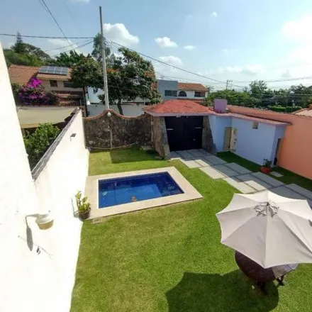 Buy this 4 bed house on Calle Azucenas in Quintana Roo, 62070 San Miguel Acapantzingo