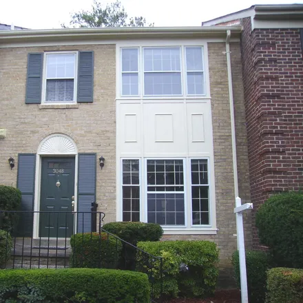 Buy this 4 bed townhouse on 3040 Federal Hill Drive in Seven Corners, VA 22044