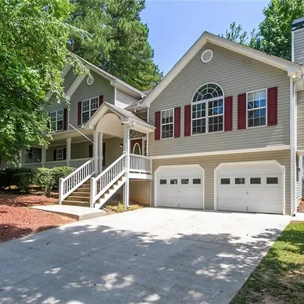 Buy this 4 bed house on 1027 Fox Hollow Trail in Holly Springs, GA 30115