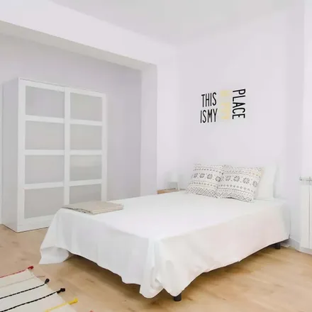 Rent this 6 bed room on Calle de Joaquín María López in 23, 28015 Madrid