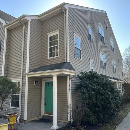 Rent this 3 bed townhouse on 29 Topeka Court in Wileys Corners, Tinton Falls