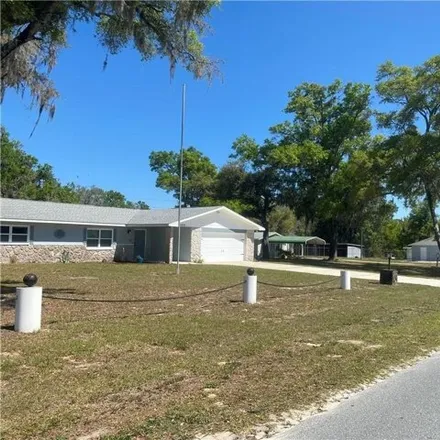 Buy this 5 bed house on 6873 West Rich Street in Citrus County, FL 34428