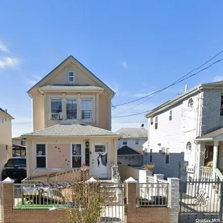 Buy this 5 bed house on 119-16 164th Street in New York, NY 11434