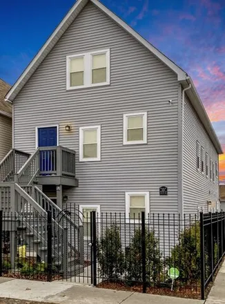 Rent this 3 bed house on 3551 West Wolfram Street in Chicago, IL 60618