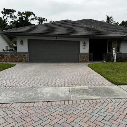 Buy this 4 bed house on 8638 Escondido Way E in Boca Raton, Florida