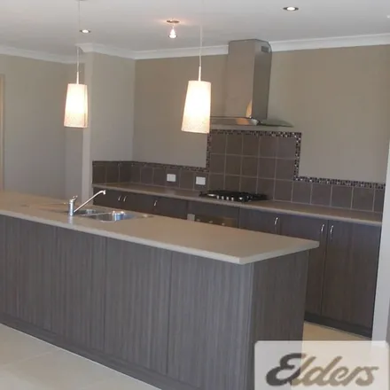 Rent this 4 bed apartment on 14 Mountain Cove in Baldivis WA 6171, Australia