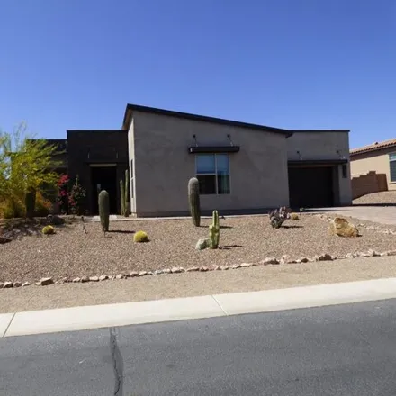 Rent this 4 bed house on 14039 North Speckled Burro Lane in Marana, AZ 85658