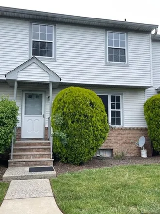 Rent this 3 bed condo on 19 Sassafras Ct in North Brunswick, New Jersey
