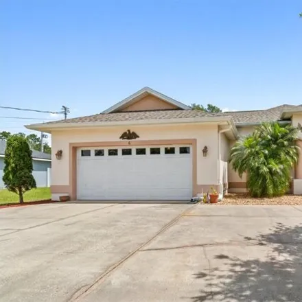 Buy this 3 bed house on Whiteview Parkway in Palm Coast, FL 32164