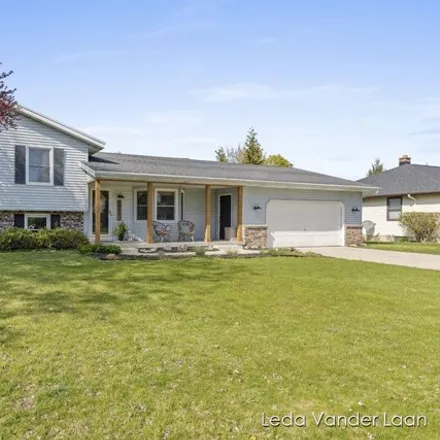 Buy this 4 bed house on 1933 Tulip Lane in Jenison, MI 49428