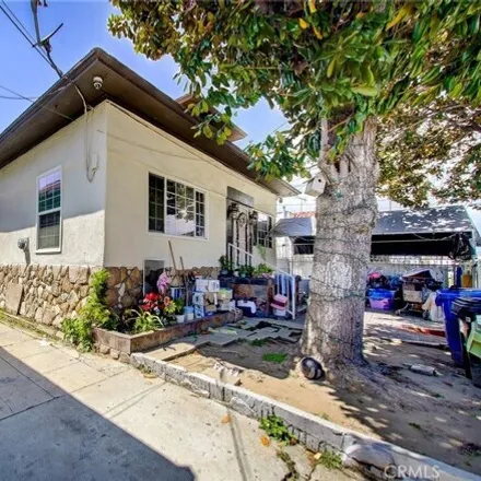 Buy this 4 bed house on San Pedro Place in Los Angeles, CA 90011