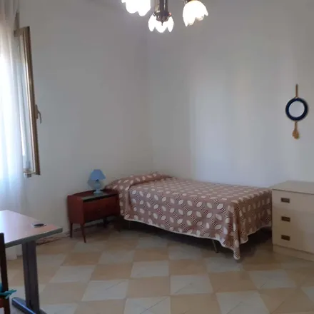 Rent this 3 bed room on Pizzeria Di Cosimo in Via Giovanni Modugno, 70125 Bari BA