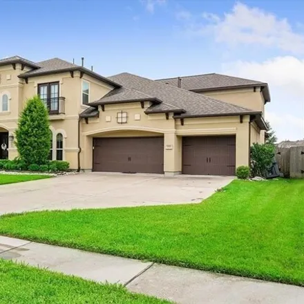 Buy this 5 bed house on 20325 Scarlett Saddle Court in Cypress Creek Lakes, TX 77433