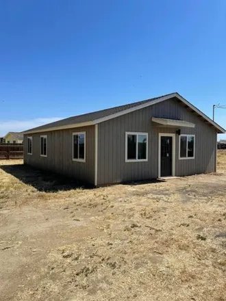 Buy this 4 bed house on 2213 Avenue 112 in Tulare County, CA 93256