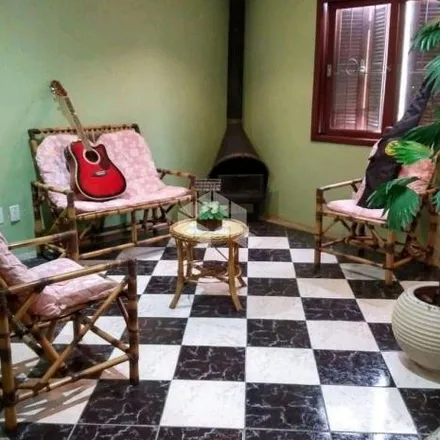 Buy this 4 bed house on Rua Miguel Ascoleze in Vila Nova, Porto Alegre - RS