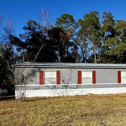 Buy this studio apartment on 279 Pixie Circle in Wakulla County, FL 32327