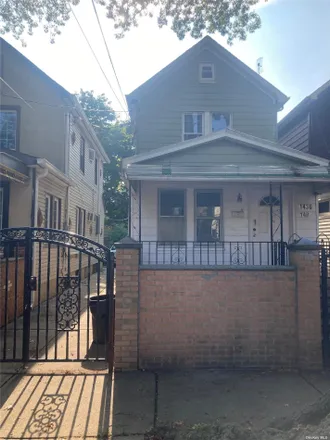 Buy this 4 bed house on 147-22 106th Avenue in New York, NY 11435
