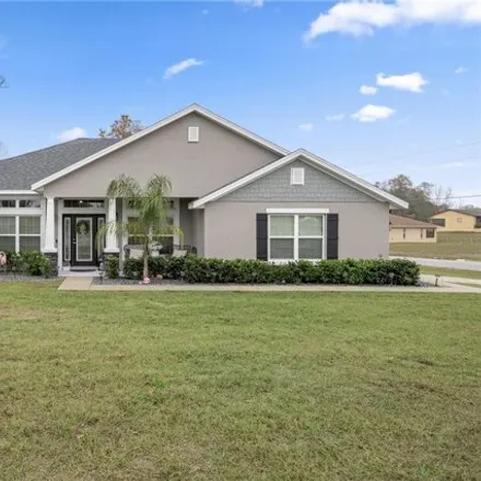 Buy this 4 bed house on 12031 Norvell Road in Spring Hill, FL 34608