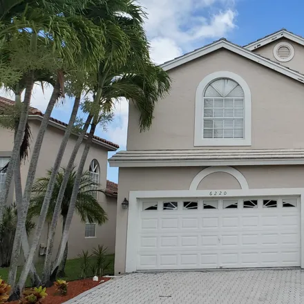 Buy this 5 bed house on 6214 Windlass Circle in Aberdeen, Palm Beach County