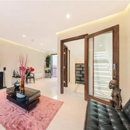 Buy this 4 bed townhouse on Thresher Owen in Battersea Square, London