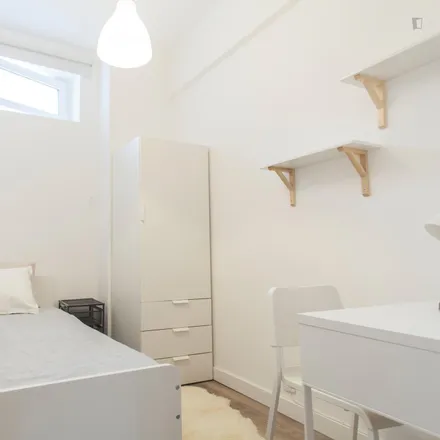 Rent this 4 bed room on Calçada de Carriche in 1750-200 Lisbon, Portugal