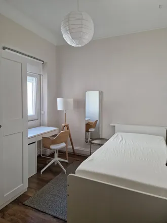 Rent this 5 bed room on Rua Quirino da Fonseca 19 in 1000-047 Lisbon, Portugal