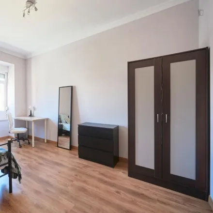 Rent this 6 bed room on Pastelaria Bélgica in Rua Filipe da Mata 1, 1600-021 Lisbon