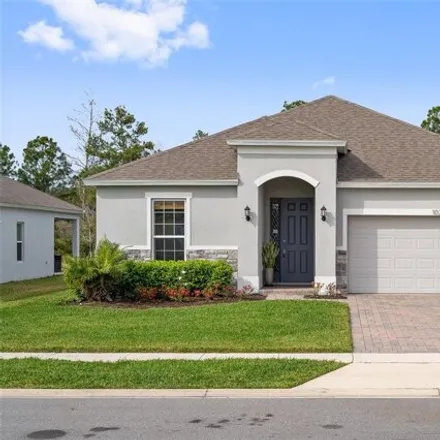 Buy this 4 bed house on 1032 Commuter Drive in Deltona, FL 32738