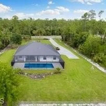 Image 2 - 167 Everglades Blvd N, Naples, Florida, 34120 - House for sale