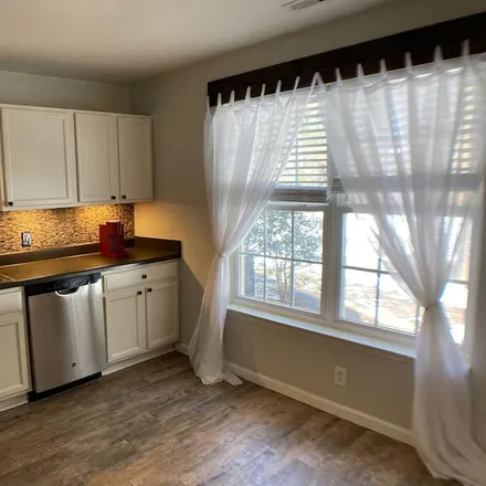 Rent this 2 bed townhouse on Raleigh