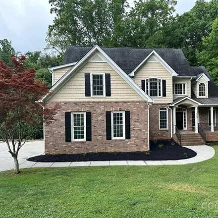 Buy this 4 bed house on 6009 Windy Knoll Ln in Mint Hill, North Carolina