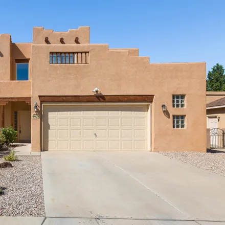 Buy this 4 bed house on 10823 Argonite Drive Northwest in Albuquerque, NM 87114