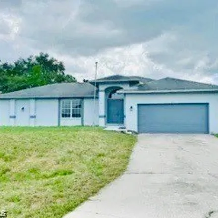 Rent this 4 bed house on 371 8th Avenue in Lehigh Acres, FL 33936
