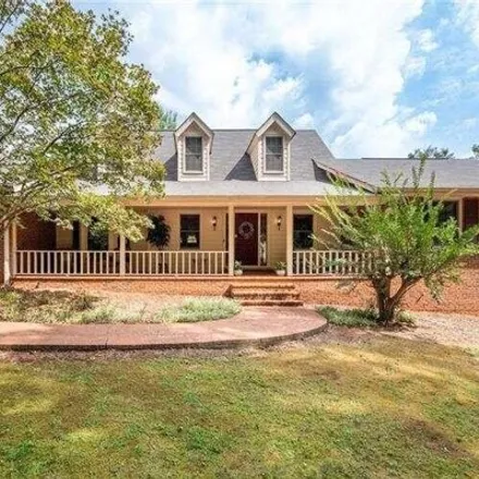 Buy this 4 bed house on 1827 Lost Mountain Rd in Powder Springs, Georgia