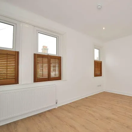 Image 2 - Laburnum Road, London, SW19 1BQ, United Kingdom - Townhouse for rent