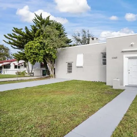 Rent this 3 bed house on 1147 Northwest 77th Street in Miami, FL 33150