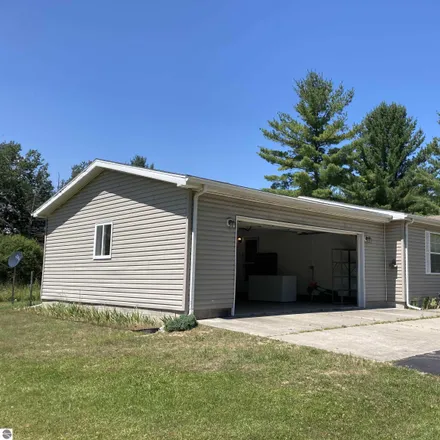 Buy this 3 bed house on 798 Sensabaugh Road in Cumming Township, MI 48635