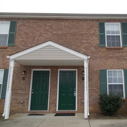 Rent this 2 bed townhouse on 240 Executive Ave Apt C in Clarksville, Tennessee