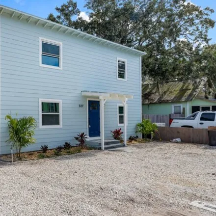 Buy this 7 bed house on 307 Rush Street in New Smyrna Beach, FL 32168
