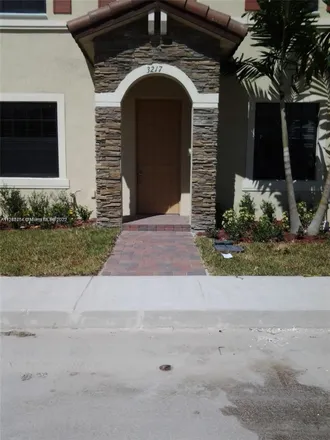 Rent this 2 bed townhouse on 3217 Southeast 4th Street in Homestead, FL 33033