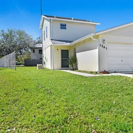 Buy this 3 bed house on 1563 Croftwood Drive in Melbourne, FL 32935