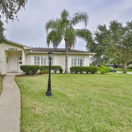 Buy this 4 bed house on 10801 Carrollwood Drive in Mullis City, FL 33618