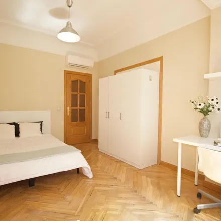 Rent this 6 bed apartment on Madrid in Calle de Isabel La Católica, 12
