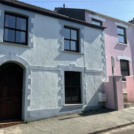 Buy this 4 bed townhouse on St. John's Hill in Tenby, SA70 8HF