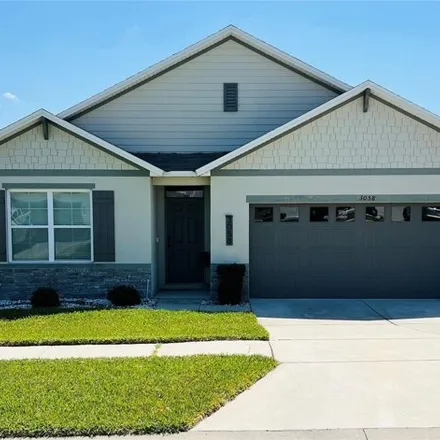 Rent this 4 bed house on Royal Tern Drive in Winter Haven, FL