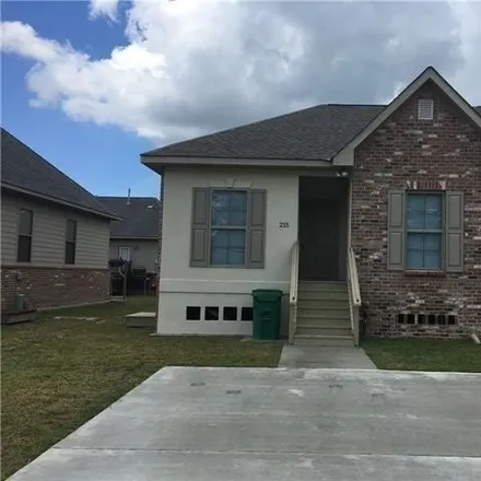 Rent this 3 bed house on 387 Silver Oak Drive in Kings Point, St. Tammany Parish
